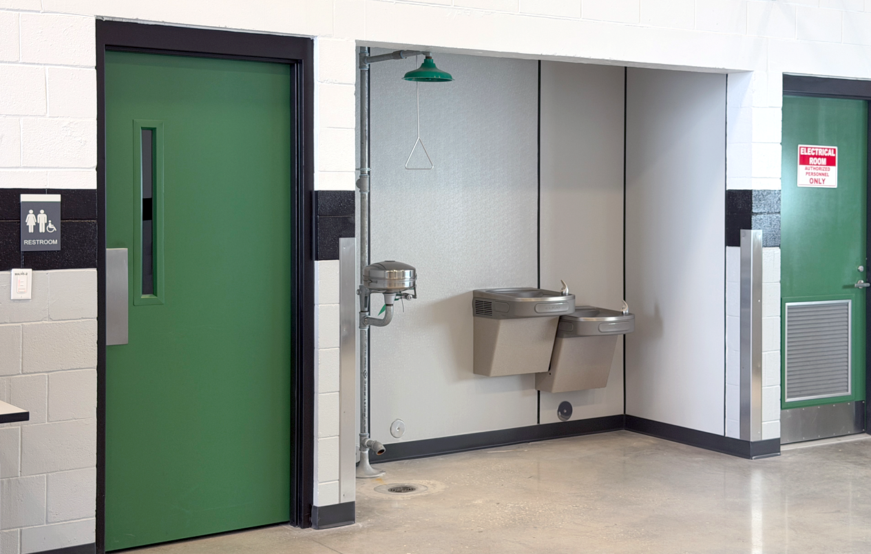 This is a picture of the Safety Station, water fountains and bathrooms at a Workshop Bay.