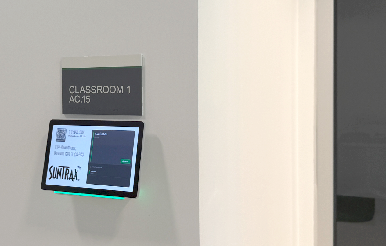 This is a picture of the Arrival and Conference building classroom with digital sign in.